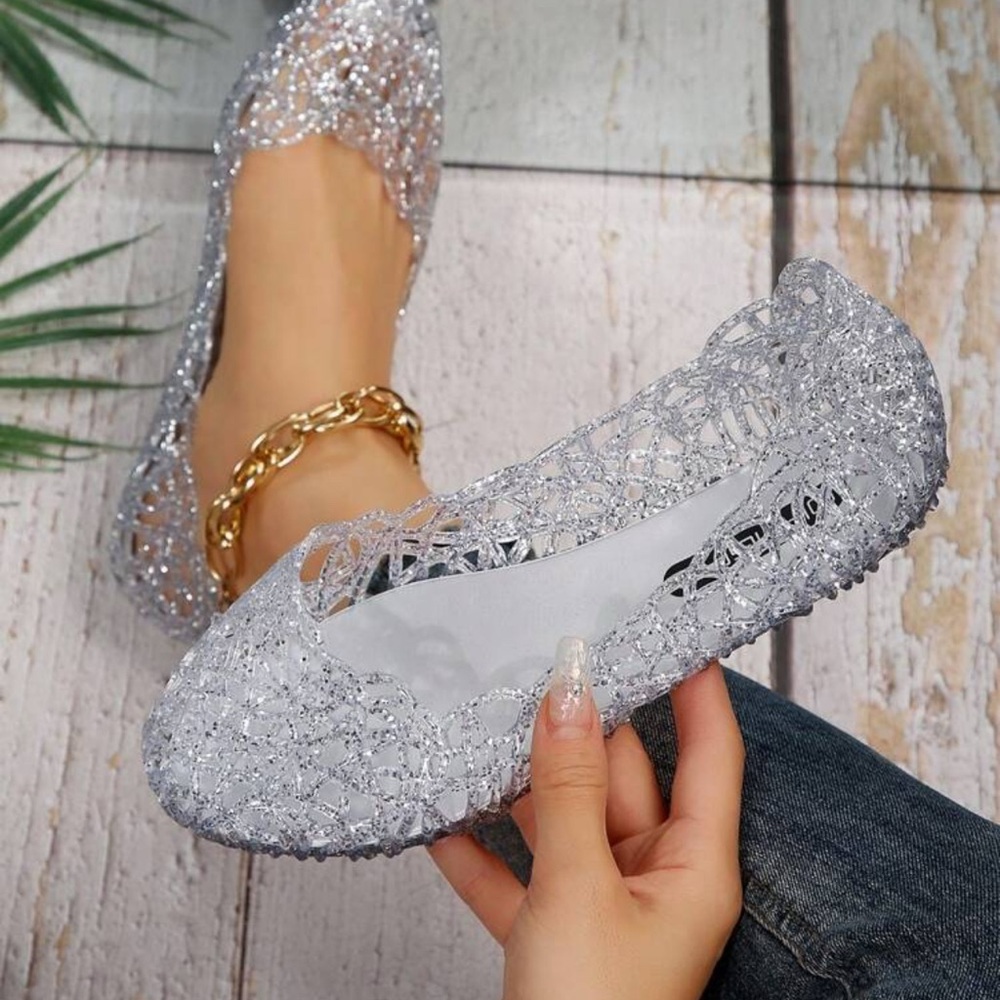Like New Women’s Jelly Silver/Clear Flats/ size 7